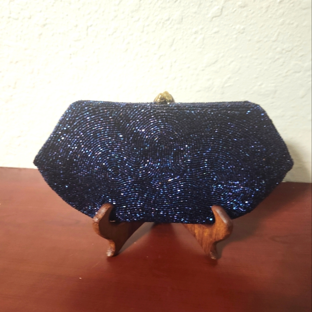 Dormar brand navy sequence evening bag 8"x4"